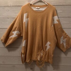 Easel Tan Sweater with White Lightning Design. Oversized. Distressed. Soft.